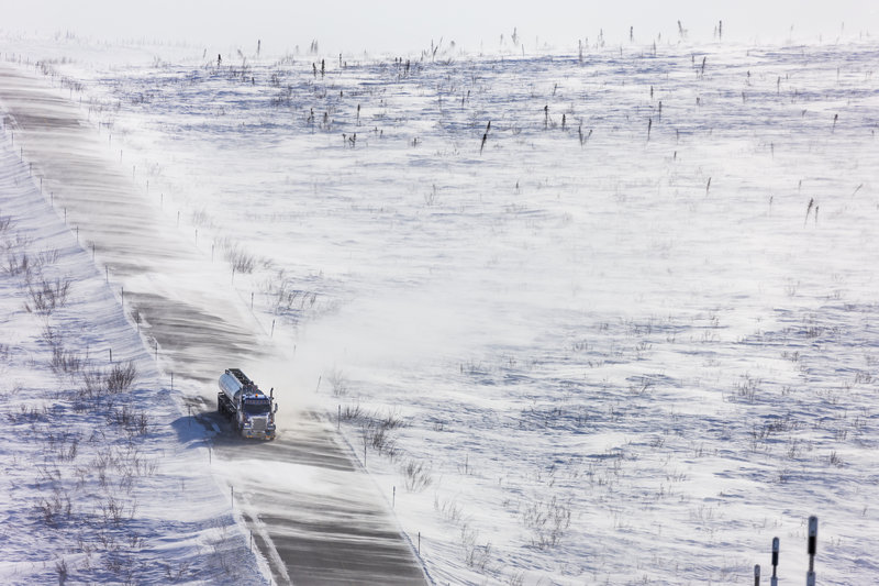 Blowing snow across the James Dalton Highway near Finger Mountain, a notoriously winder area along the "Haul Road" that leads from Fairbanks to Prudhoe Bay, Alaska.