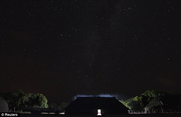 Remote: A photograph of the Yawalapiti village, taken at night, before the ritual lasting several days got under way